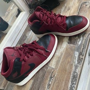 Mid burgundy and black Air Jordans